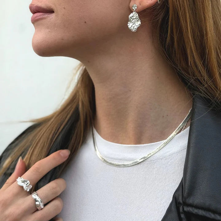 Silber- und vergoldeter Magma-Schmuck